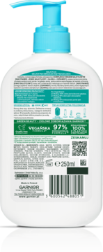Tył białej butelki płynu do mycia twarzy Garnier z pompką 250ml. Formuła z kwasem hialuronowym, glinką i ceramidami.