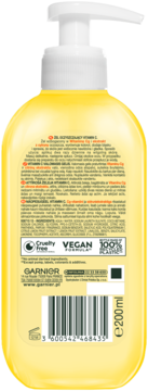 Tył żółtego żelu do mycia twarzy Garnier Vitamin C, etykieta z opisem działania, składników i certyfikatem Vegan.