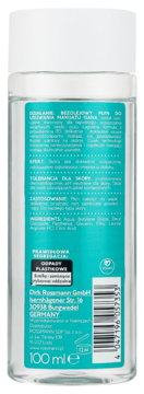 Tył płynu do demakijażu oczu Isana, przezroczysta butelka z białą nakrętką i turkusową etykietą, widoczny kod kreskowy.