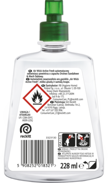 Air Wick Automatyczny odświeżacz drzewo sandałowe, tył przezroczystej butelki z zielonym dozownikiem i etykietą ostrzegawczą, 228 ml.