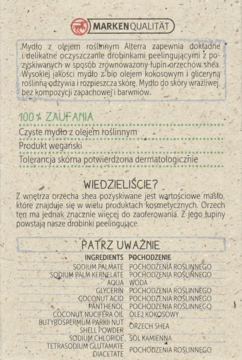 Mydło Alterra wegańskie z peelingiem shea, tył opakowania z widoczną teksturą i listą składników.