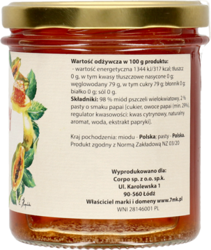 Tył szklanego słoika miodu wielokwiatowego z pastą papai, z etykietą i grafiką owoców papai.