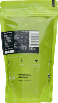 Tył zielonej torebki łuskanych pestek dyni Coco Farm 250g, z tabelą wartości odżywczych i kodem kreskowym.