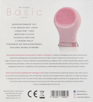 Tył opakowania szczoteczki sonicznej do twarzy B-Fresh Basic z opisem, obok różowa szczoteczka silikonowa.