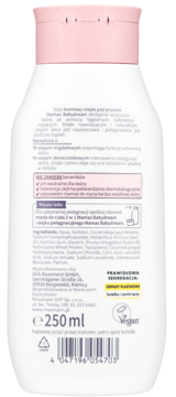 Tył białej butelki Mamas Babydream kremowego olejku pod prysznic 250 ml, różowa zakrętka, widoczne składniki i symbol Vegan.