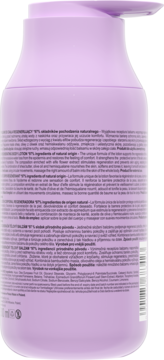 Tylna strona fioletowego balsamu Holify z pompką. Widoczne etykiety ze składem, 97% naturalnego, z kwiatem Elfów.