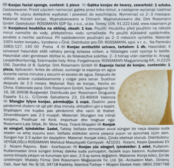 Naturalna gąbka konjac do twarzy, okrągła, jasna i porowata, zbliżenie z boku, częściowo widoczna.