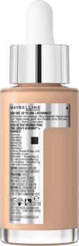 Tył beżowej butelki tintu Maybelline Super Stay 24H Glow Skin z kroplomierzem, widoczna biała etykieta.