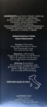 Tył czarnego opakowania perfum z pełną listą składników, ostrzeżeniami i informacją 'PERFUME MADE IN ITALY'.