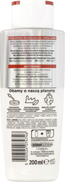 Tył opakowania białego szamponu L'Oréal Bond Repair 200 ml, z opisem technologii i kodem kreskowym.