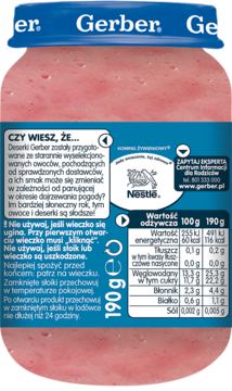 Tył różowego słoika Gerber z deserkiem owocowym, z niebieską nakrętką i polskimi etykietami. Widoczne informacje o wartościach odżywczych.