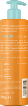 Balsam do ciała Juicy Glow z witaminą C, widok z tyłu pomarańczowej butelki z niebieską pompką, 400 ml.