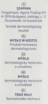 Multilingual product label for soap, with distributor details, ingredients, and dermatological testing info visible.