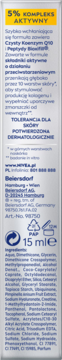 Tył opakowania serum NIVEA Q10 Precyzyjny Wypełniacz Zmarszczek 15ml, z żółtym bannerem i składem.