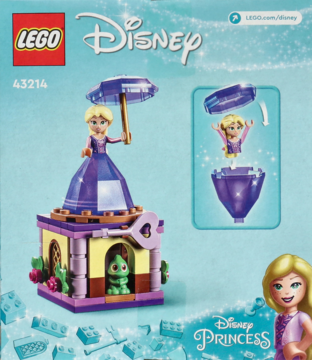 LEGO Disney Wirująca Roszpunka 43214: fioletowa wieża z figurką Roszpunki w diamentowej sukni.