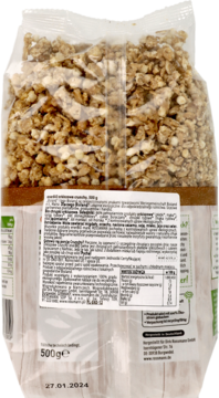 Tył przezroczystej torby enerBiO orkiszowe crunchy 500g, widoczne jasnobrązowe płatki i duŴa biała etykieta z polskim tekstem.