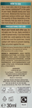 Tył opakowania samoopalacza Garnier Ambre Solaire 30ml z instrukcją użycia i składem.