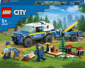 Opakowanie LEGO City zestawu policyjnego 60349: biały SUV, laweta, policjant z psem, złodziej. Teren leśny.