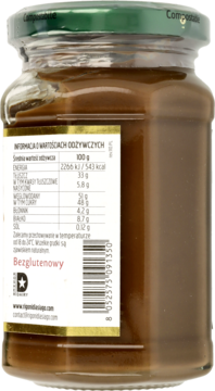 Tył słoika organicznego kremu z orzechów laskowych, zielona nakrętka, widoczna etykieta wartości odżywczych, bezglutenowy.