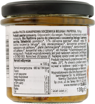 Tył szklanego słoika z wegańską pastą kanapkową Beluga Lentil, widoczna etykieta z danymi odżywczymi.