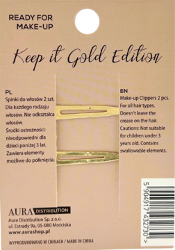 Tył beżowego opakowania złotych spinek do włosów Aura "Keep it Gold Edition", widoczne dwie spinki i napisy.