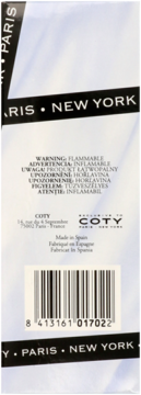 Back of Coty perfume box, white with black warning text, barcode, and 'Made in Spain' label.