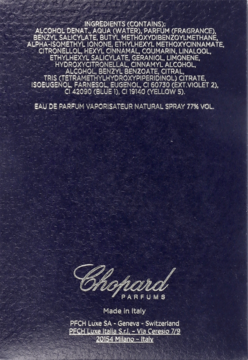 Tył ciemnofioletowego opakowania perfum Chopard Wish z białą listą składników i napisem Made in Italy.