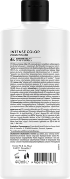 Tył białej butelki odżywki Syoss Intense Color 440ml z czarną nakrętką i widocznym opisem oraz składnikami.