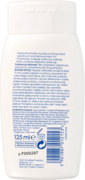 Tył białej butelki Ziajka SPF 50+ wodoodporna emulsja ochronna dla dzieci, widoczne etykiety i składniki.