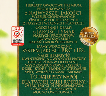 Górna część ciemnozielonego opakowania herbaty owocowej Premium żurawina z granatem. Widoczne złote i czerwone odznaki jakości.