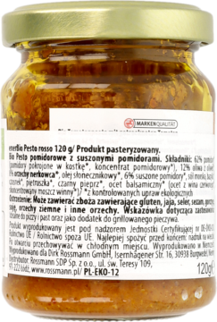Tył szklanego słoika EnerBio Pesto Rosso 120 g, z białą etykietą zawierającą polskie informacje o składzie.