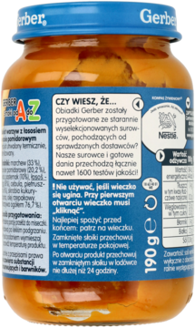 Tył słoiczka Gerber obiad warzywa z łososiem, niebieska nakrętka, etykieta z instrukcjami i logo Nestlé.