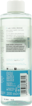 Tył przezroczystej butelki olejku Tołpa 200 ml, z biało-niebieską etykietą, szczegółami składu i kodem kreskowym.