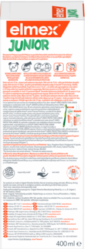 Tył opakowania elmex JUNIOR płyn do płukania ust 400ml, biało-pomarańczowe z tekstem i ikonami.
