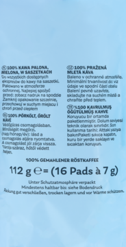 Laudatio 112g, opakowanie 16 padów 100% Arabica mielonej kawy palonej, widok z góry na niebieskim tle.