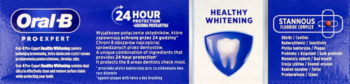 Niebieskie opakowanie pasty Oral-B Pro-Expert Healthy Whitening z logo, ikoną zęba i tekstem korzyści.