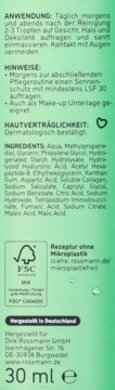 Zielony tył opakowania serum ISANA z peptydami i kolagenem, biały tekst o składzie, bez mikroplastiku, 30 ml.