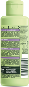 Tył zielonej butelki Garnier Fructis Method Pre-szamponu do loków, z polskim opisem, listą składników i kodem kreskowym.