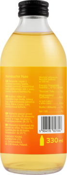 Z tyłu butelka Kombuchy Yuzu Forever Young, fermentowany napój z herbaty, pomarańczowa etykieta, 330ml.
