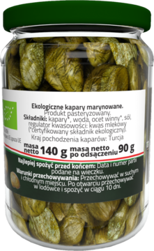 Ekologiczne kapary marynowane w szklanym słoiku, tył z białą etykietą i widocznymi zielonymi kaparami.
