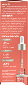 Tolpa Ideal Age serum w pomarańczowej butelce z pipetą. Zbliżenie na spływającą kroplę, widoczny płynny produkt.