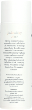 Biała butelka odżywki Health Labs Care Balance On, zbliżenie na etykietę z polskim opisem korzyści.