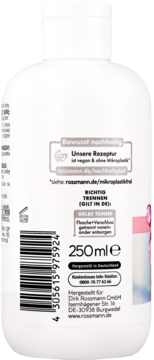Tył białej butelki Rossmann 250ml, z niemieckimi informacjami o wegańskiej recepturze i recyklingu w DE.
