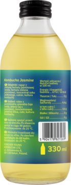 Forever Young Kombucha Jasmine, tył szklanej butelki 330 ml z żółtym napojem. Zielono-niebieska etykieta, kod EAN.