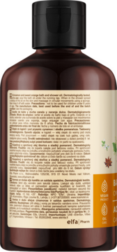 Tył brązowej butelki Green Pharmacy olejek do kąpieli o zapachu cynamonu i słodkiej pomarańczy, z czarną nakrętką.