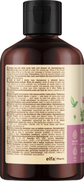 Tył brązowej butelki olejku Green Pharmacy Róża Damasceńska i Białe Piżmo, widoczna etykieta z tekstem i logo Vegan.