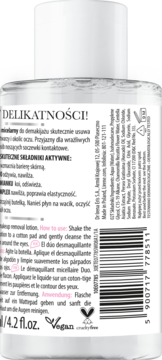 Tył przezroczystej butelki wegańskiego dwufazowego płynu micelarnego dla wrażliwej cery, z białą etykietą i kodem.