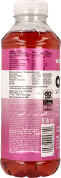 Tył butelki napoju niegazowanego czerwone winogrona i dragonfruit, widoczne etykiety z danymi odżywczymi, 555 ml.