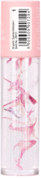 Olejek do ust Lovely Floral Fantasy w przeźroczystej butelce z różowymi płatkami kwiatów. Pionowe ujęcie, różowa nakrętka.