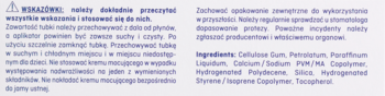 Tył etykiety super mocującego kremu do protez. Widoczne szczegółowe instrukcje i lista składników.